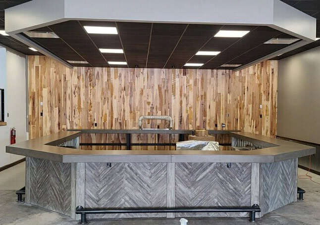 concrete bartop with wood look panels by Cement Logic in Ohio